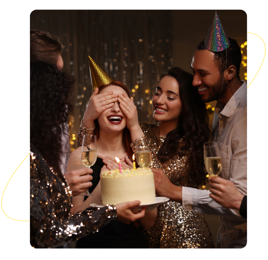 Surprise birthday party with friends and cake.