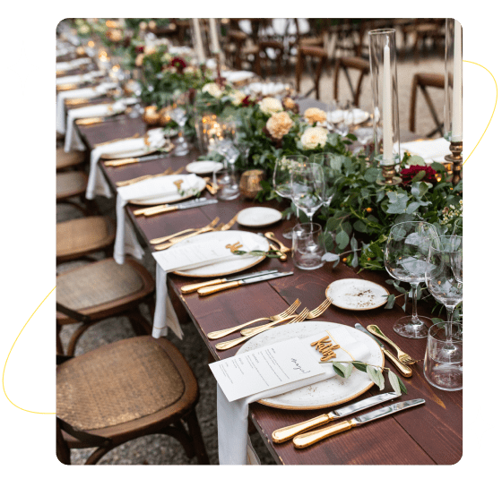 Elegant banquet table with floral arrangements.