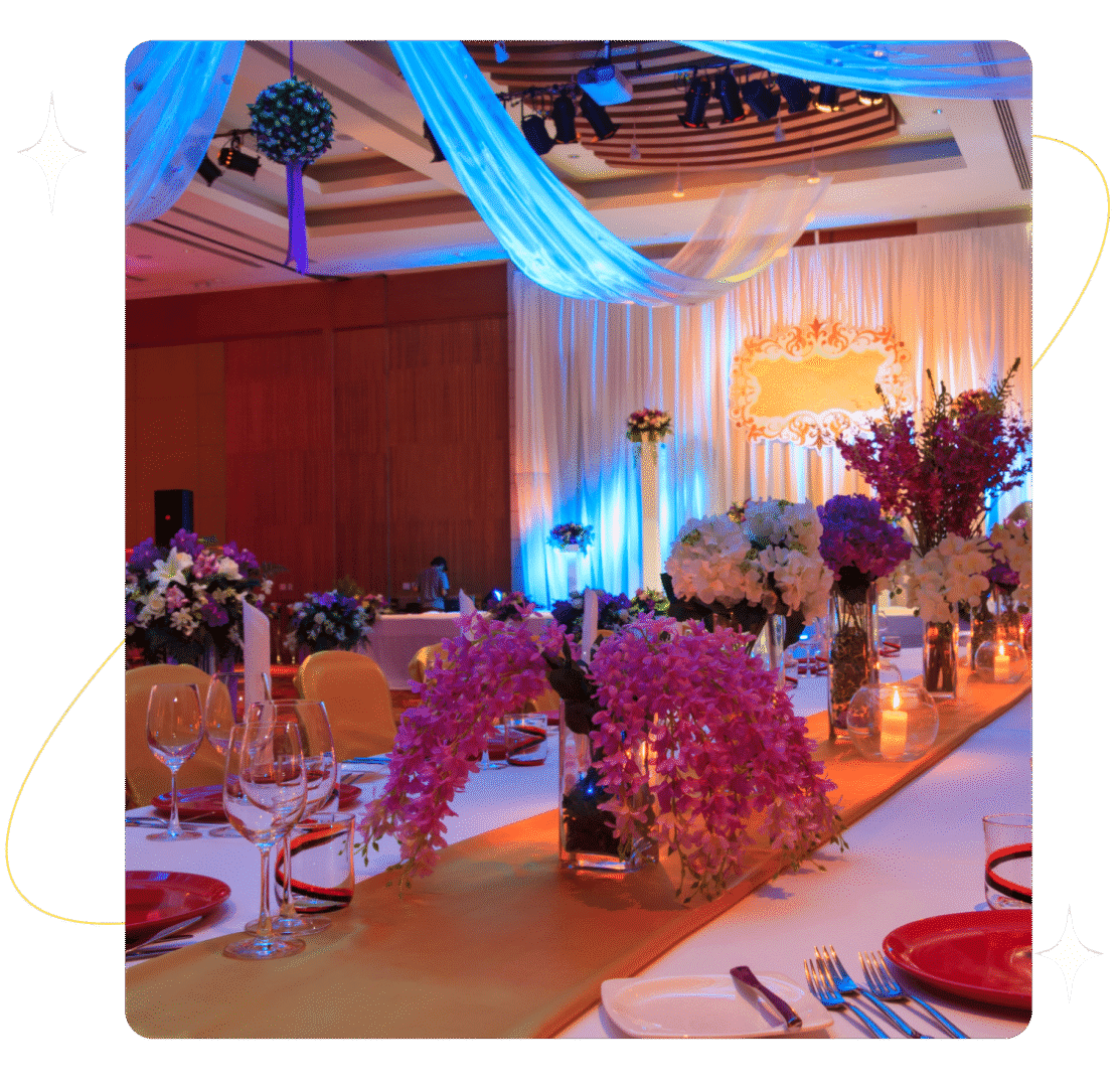 Elegant banquet hall with floral decorations.